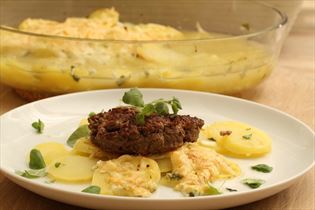 Herby beef patties with bouillon potatoes