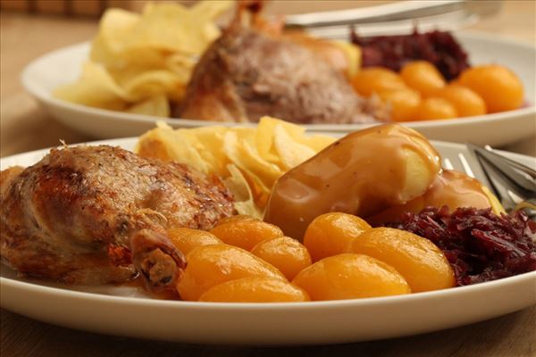 Roast duck with potatoes and red cabbage