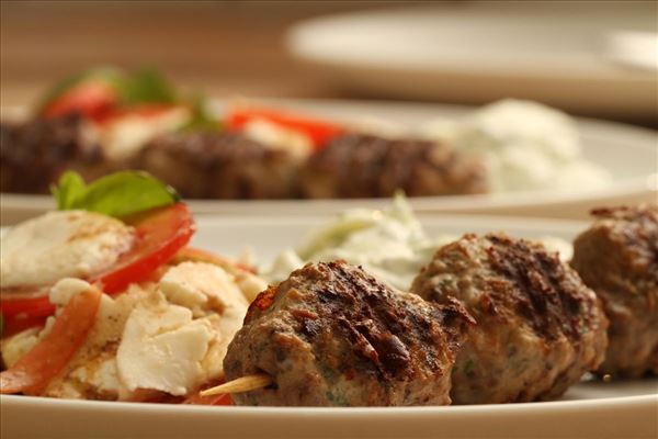 Greek meatballs with tzatziki and tomato salad