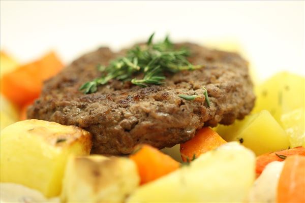 Beef burger with roasted root vegetables