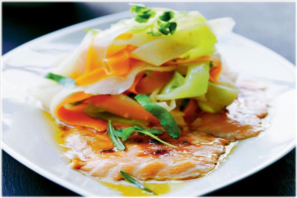 Sugar-glazed salmon with warm root vegetable salad