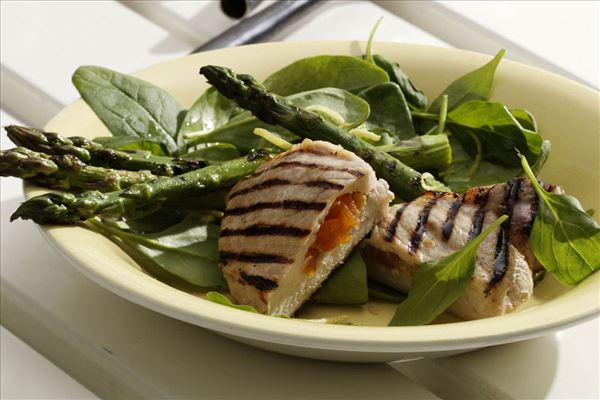 Apricot-stuffed chops and spinach with asparagus