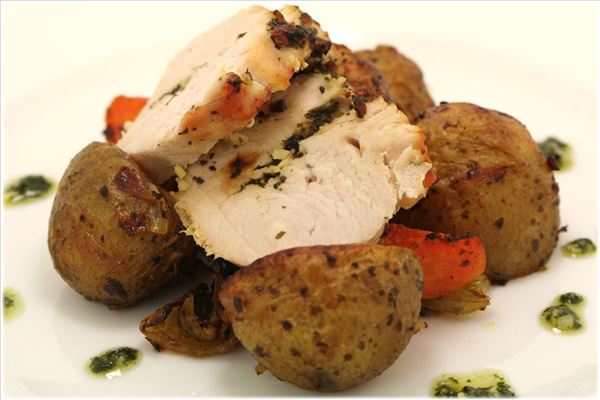 Turkey breast with pesto and root vegetables